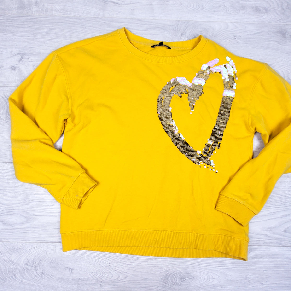 George yellow sweatshirt with flip sequin heart. Size 14/16