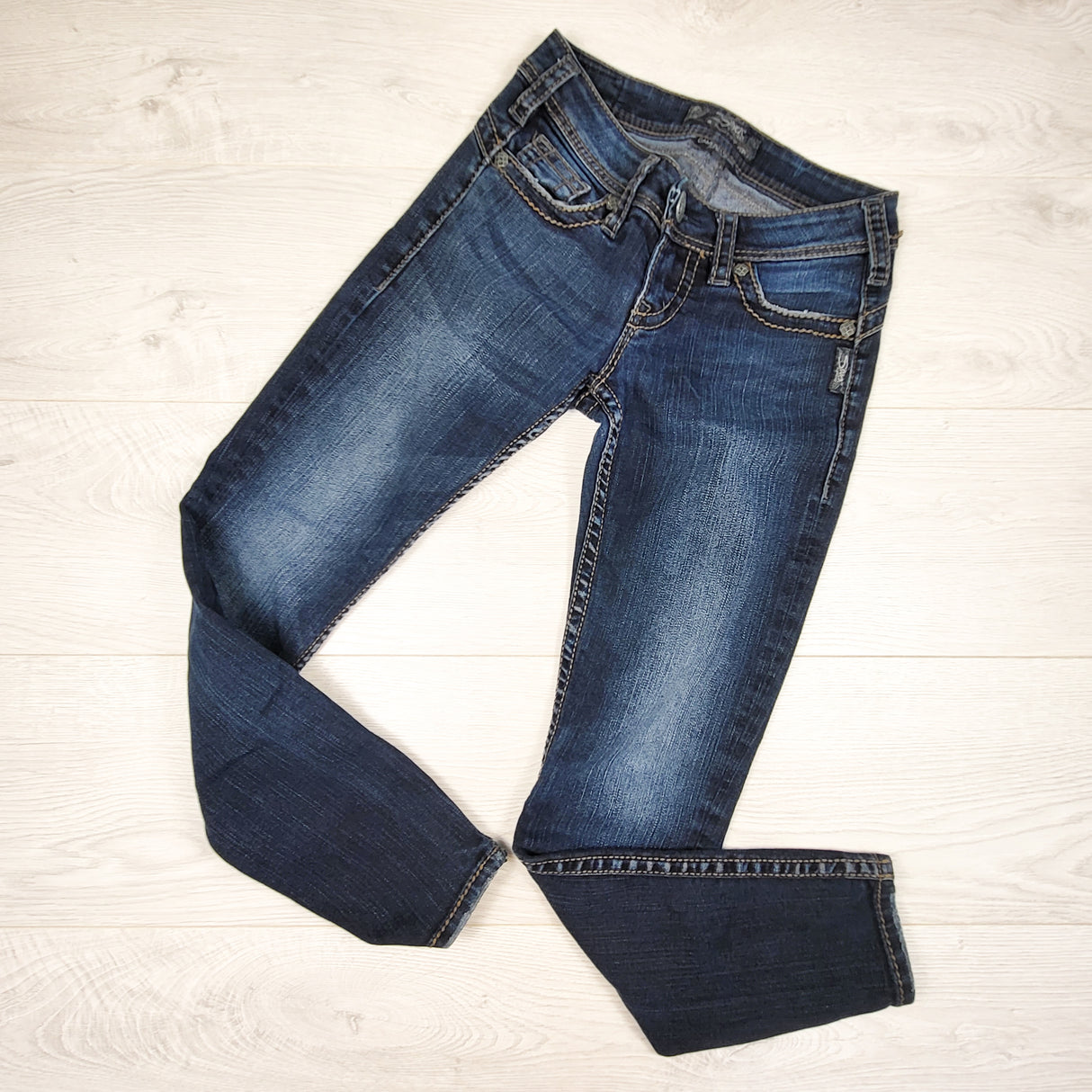 Silver "Camden Rose" skinny ankle jeans. Size 24 waist