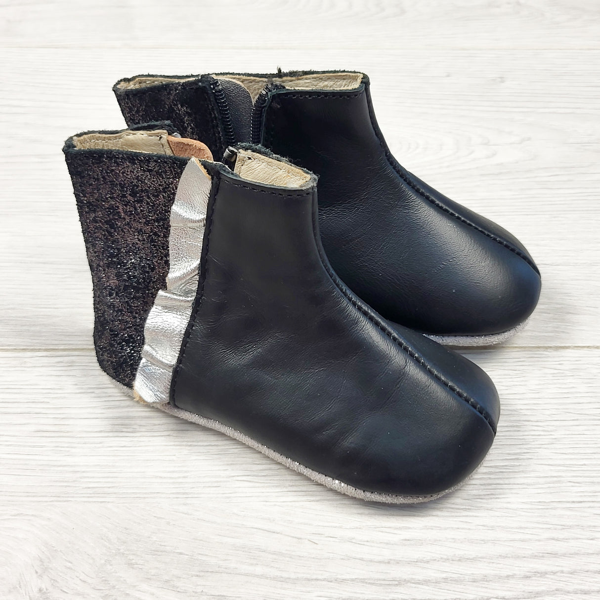 Robeez black soft soled leather booties. Size 6-9 months