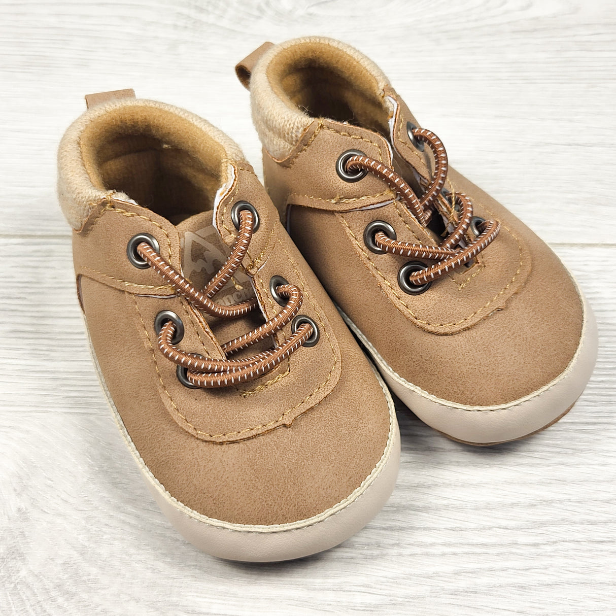 Avalanche brown soft soled shoes. Infant size 2
