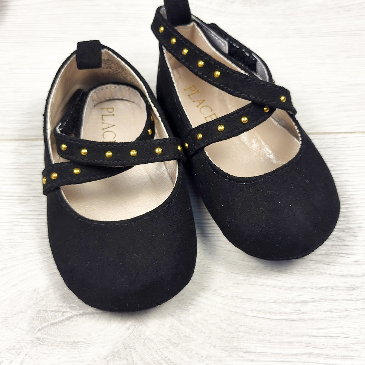 Children's Place black soft soled shoes with studs. Size 6-12 months