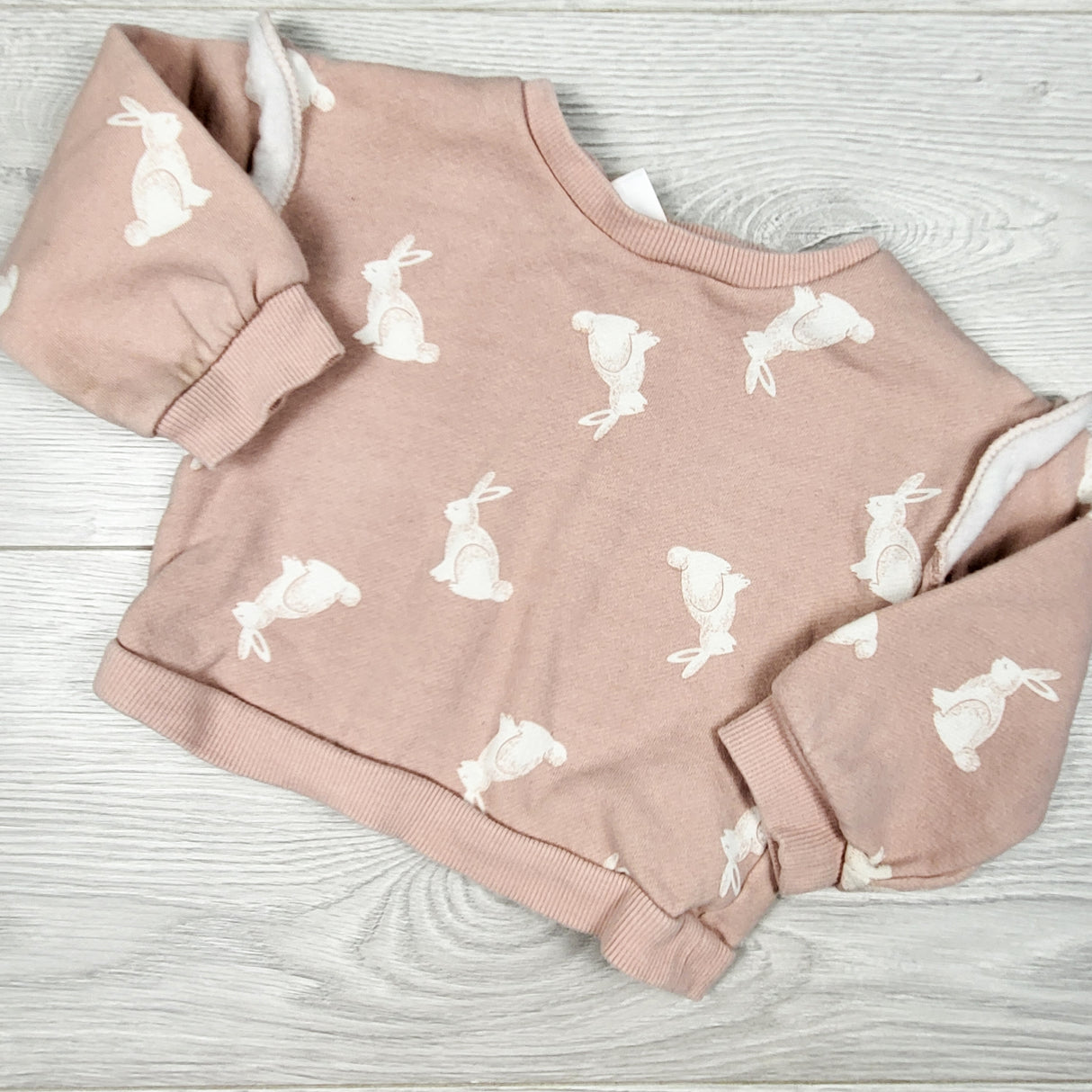 Carters pink striped sweatshirt with bunnies. Size 12 months