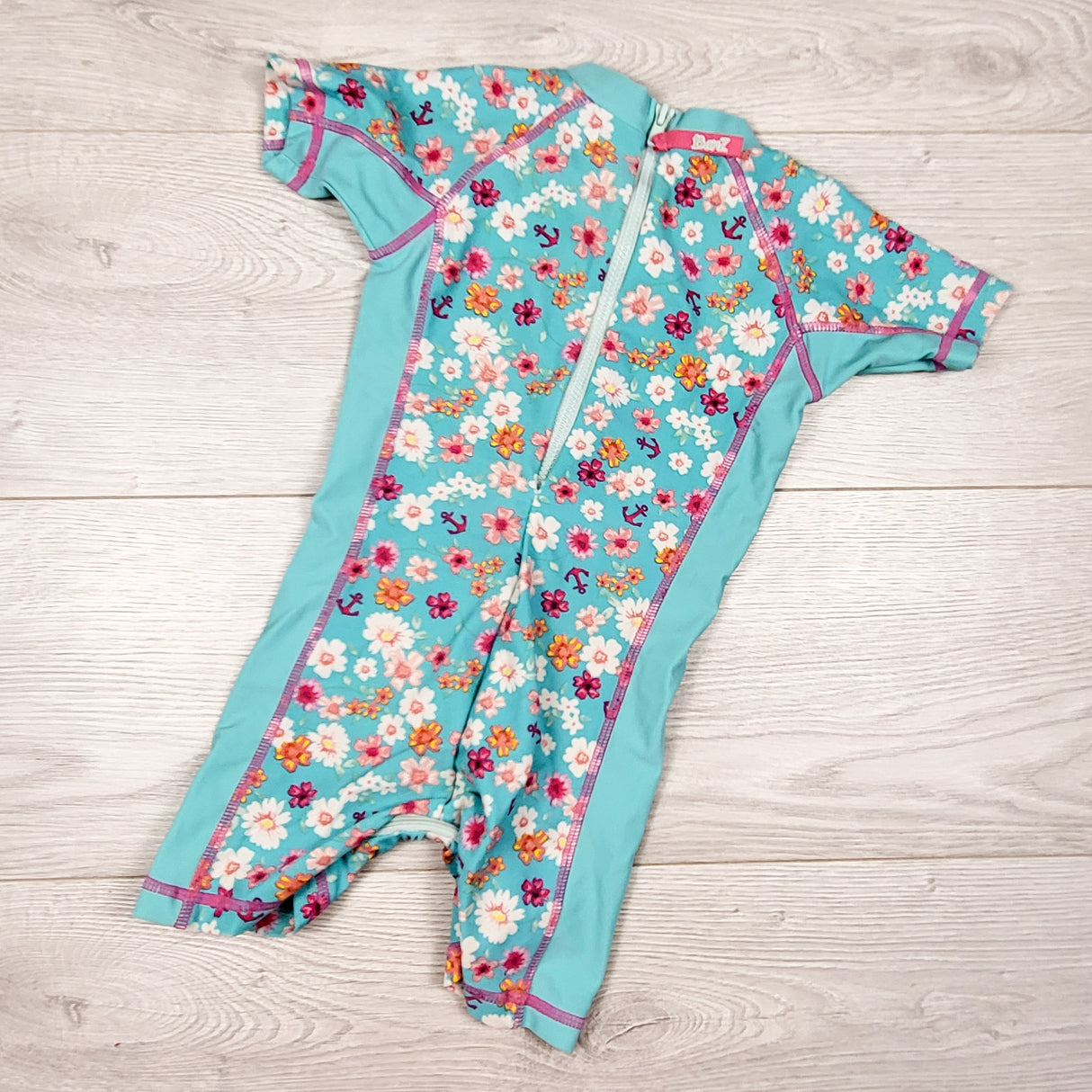 Banz blue floral print UPF protection suit. Size 6 months