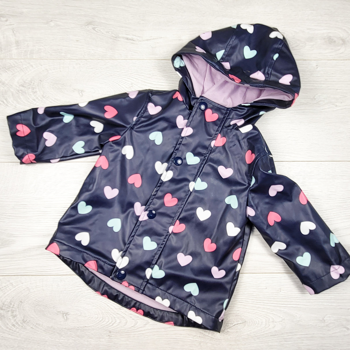 Joe navy lined rain coat with hearts. Size 6-12 months