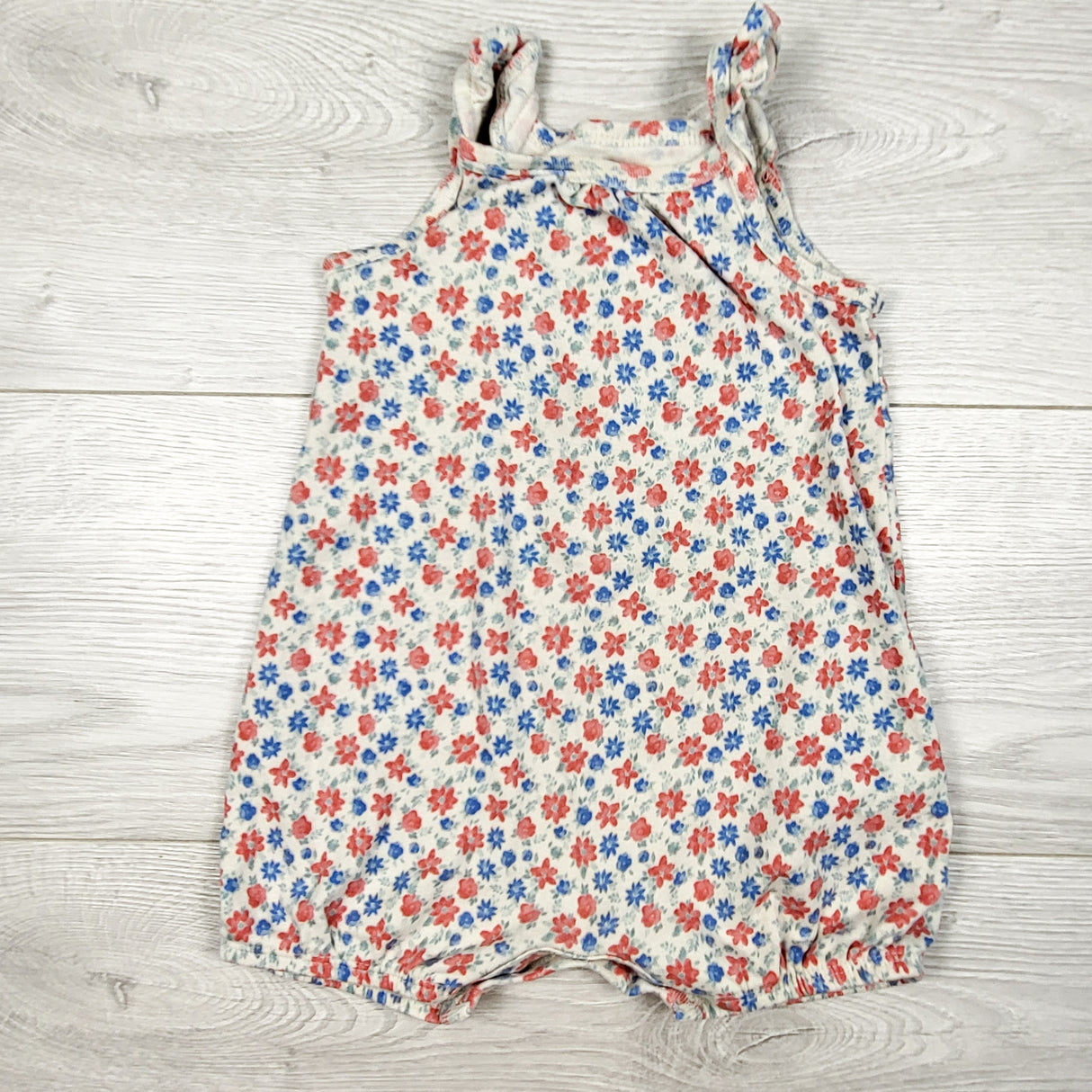 Carters floral print tank style body romper. Size 9 months