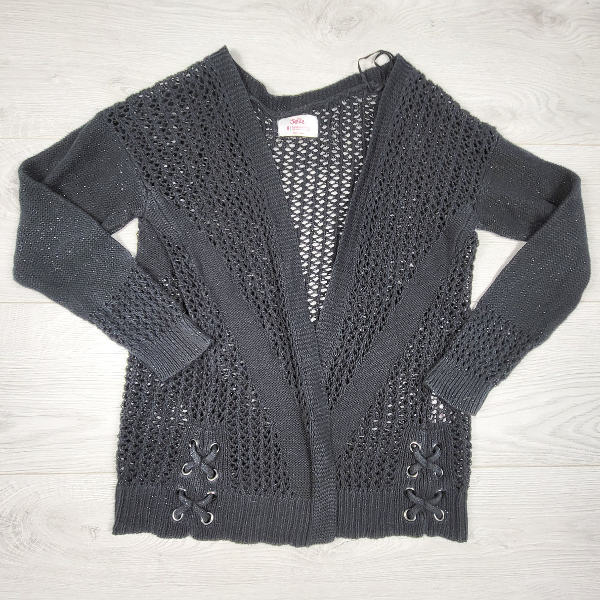 Justice black open knit sweater with sparkles. Size 8