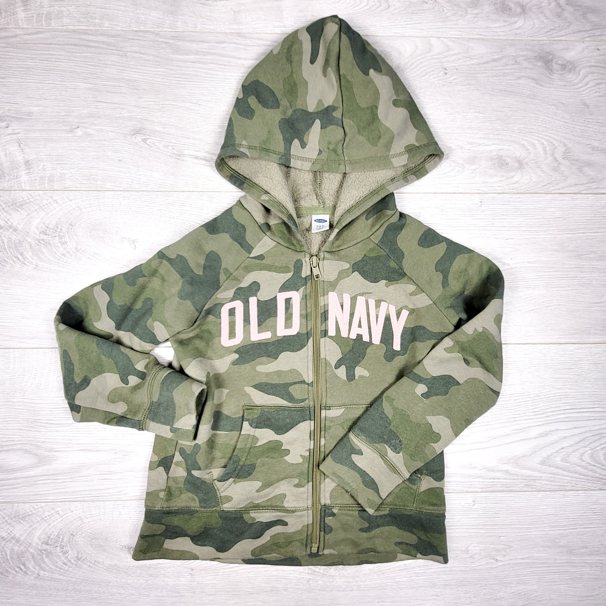 Old Navy camouflage zip up hoodie. Size 6/7