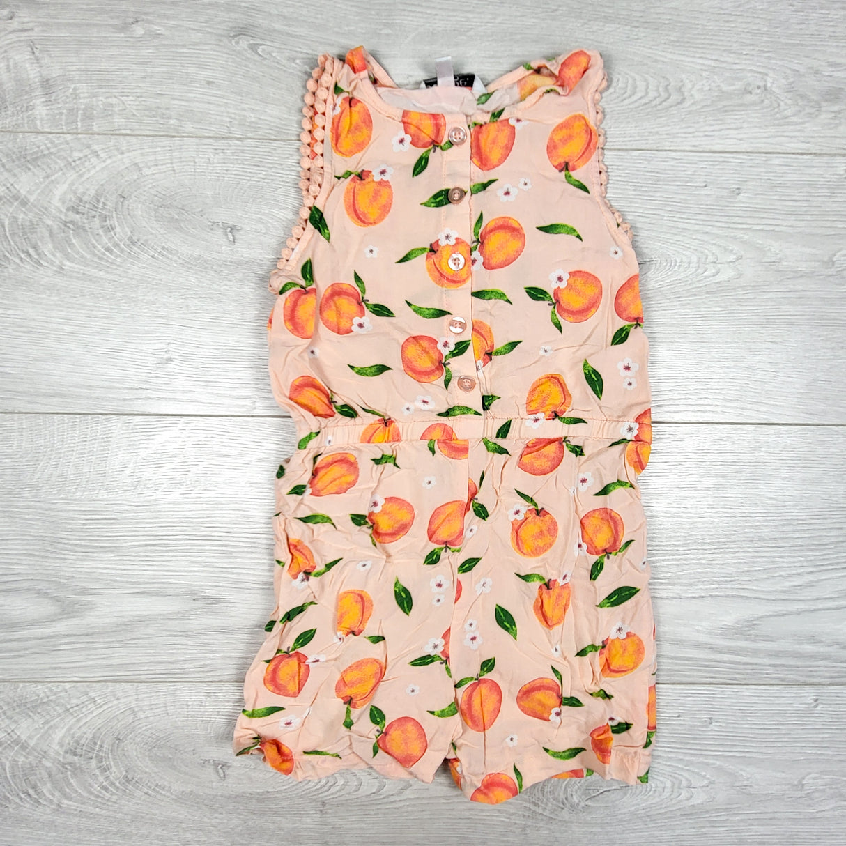 George peachy-pink rayon romper with oranges. Size 5T
