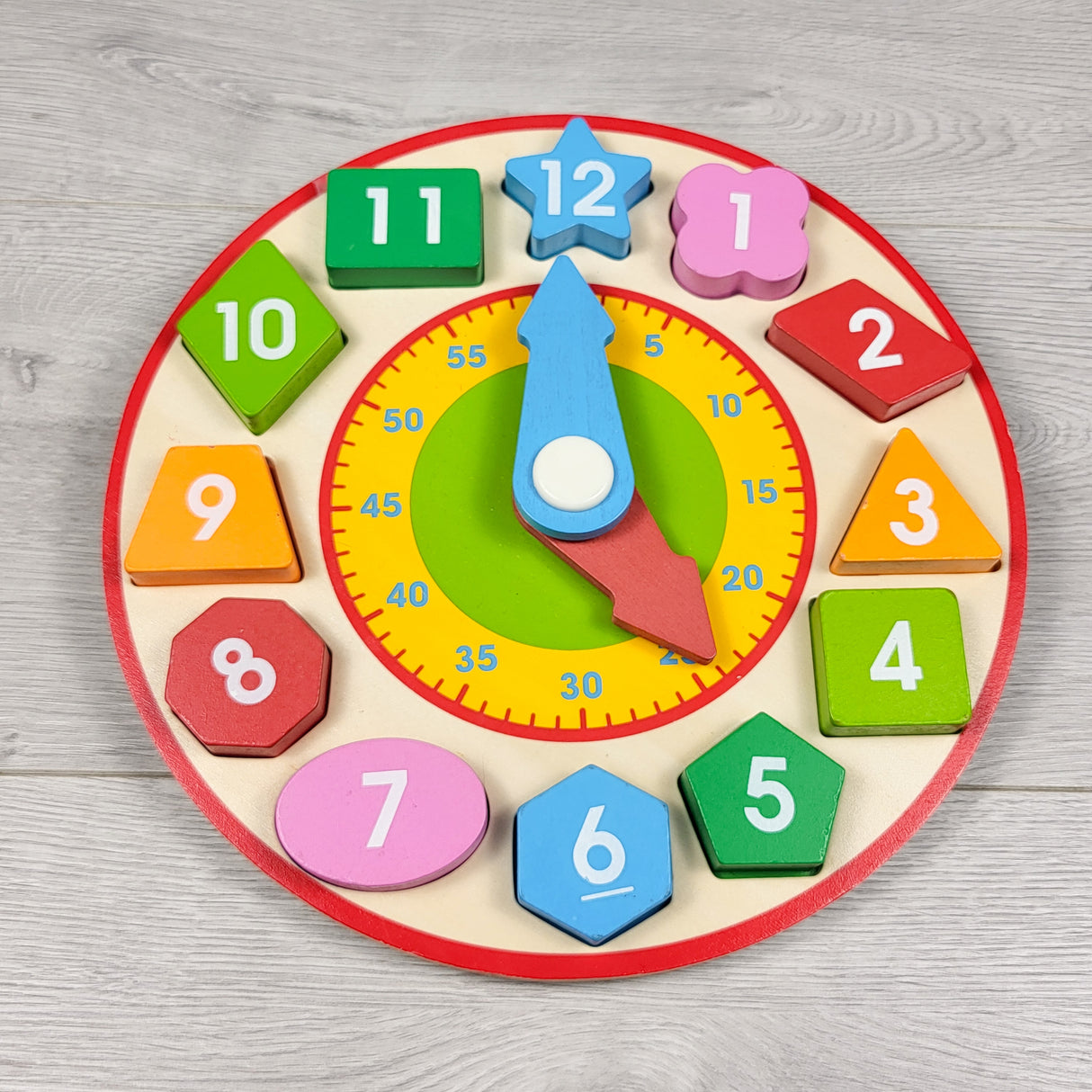 Melissa and Doug wooden shape sorting clock