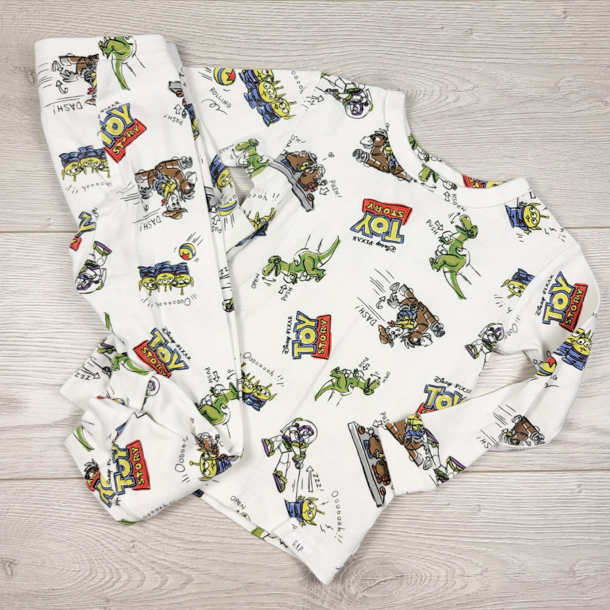 Gap x Pixar white 2pc organic cotton Toy Story PJs. Size 2T