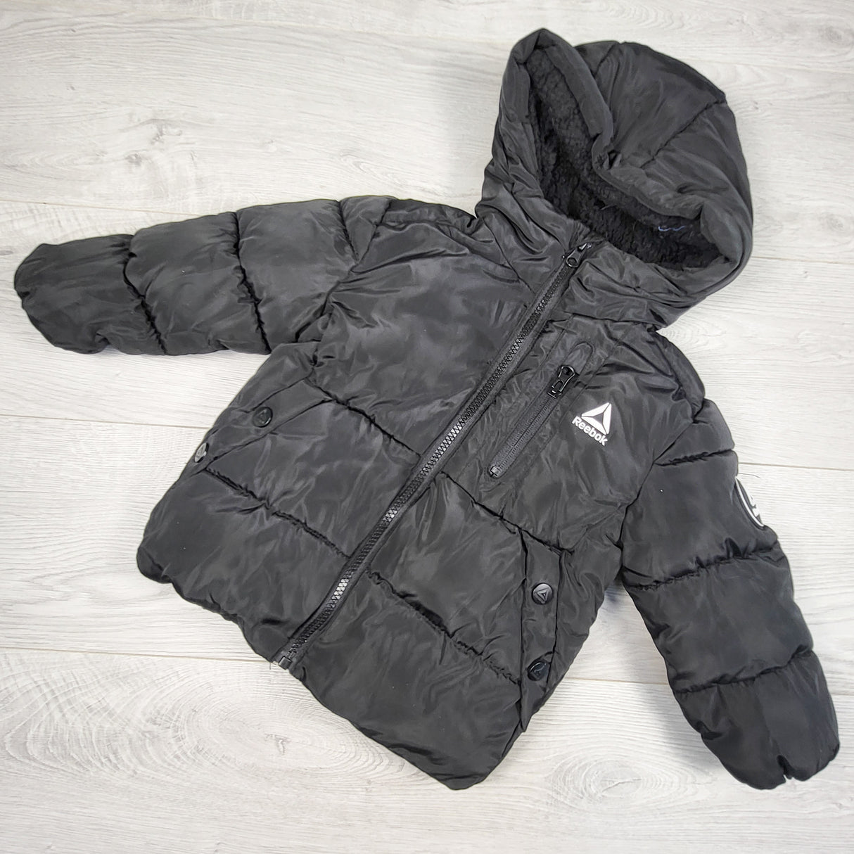 Reebok black fleece lined hooded puffer jacket. Size 3T