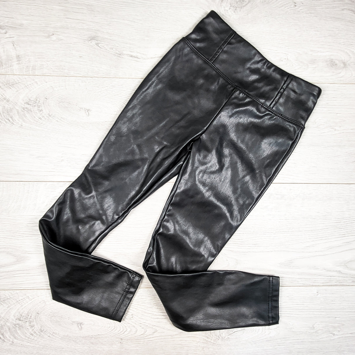 Love Fire black faux leather leggings. Size 5T