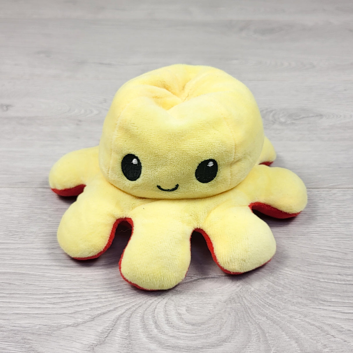 Reversible octopus plush (mad on other side)
