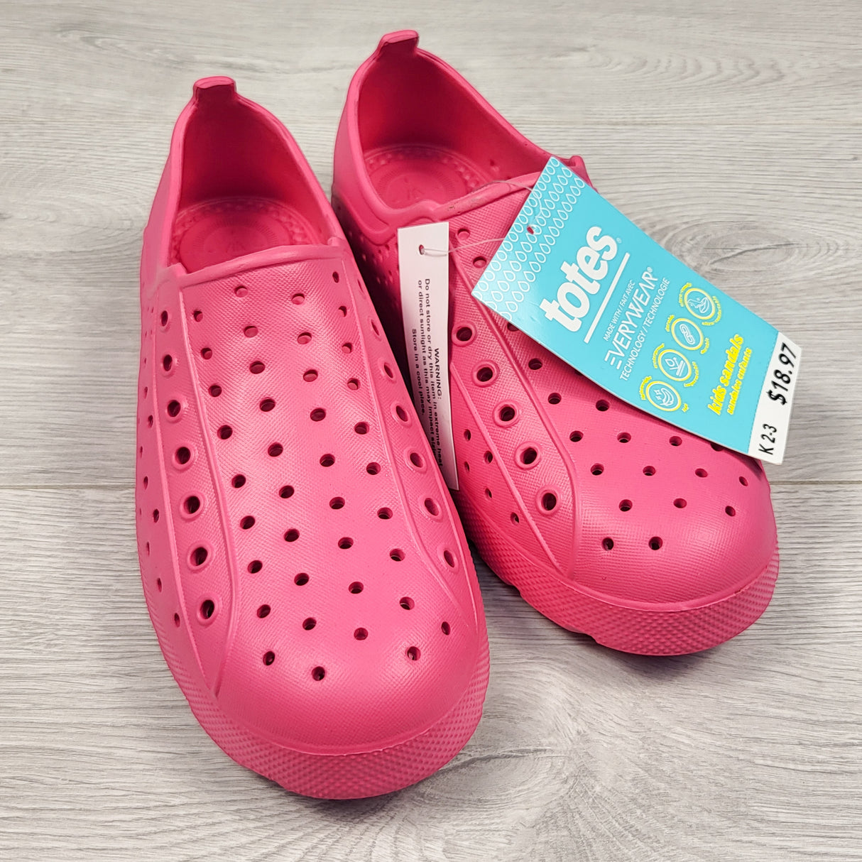 NEW - Everywear pink slip-on shoes. Youth size 2/3