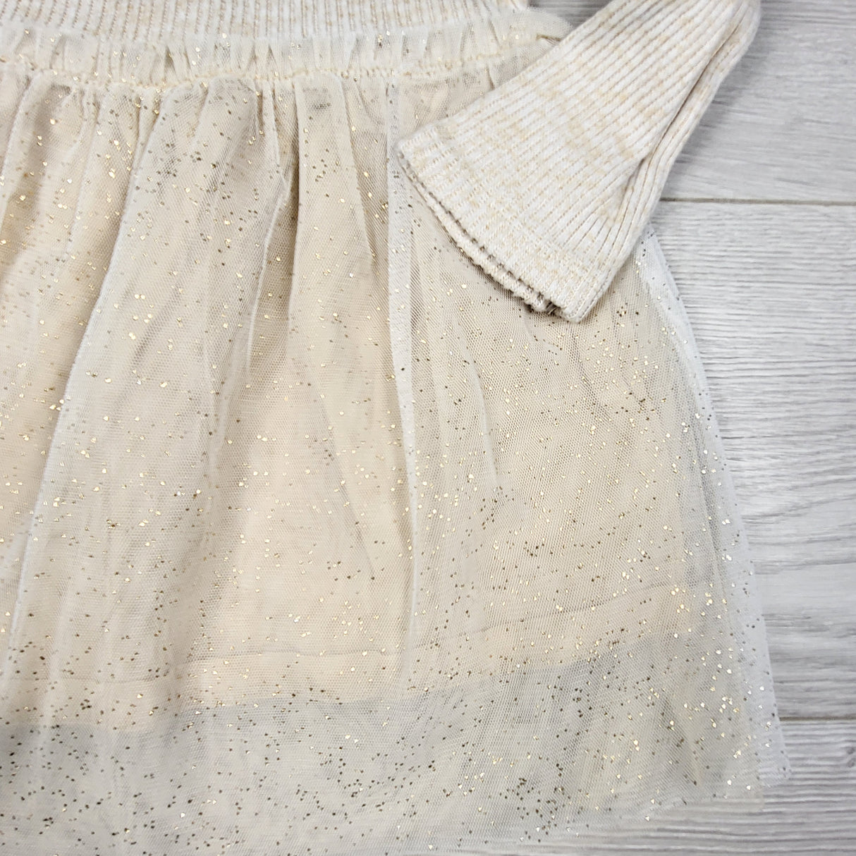 Oshkosh beige ribbed dress with sparkle tulle skirting. Size 2T