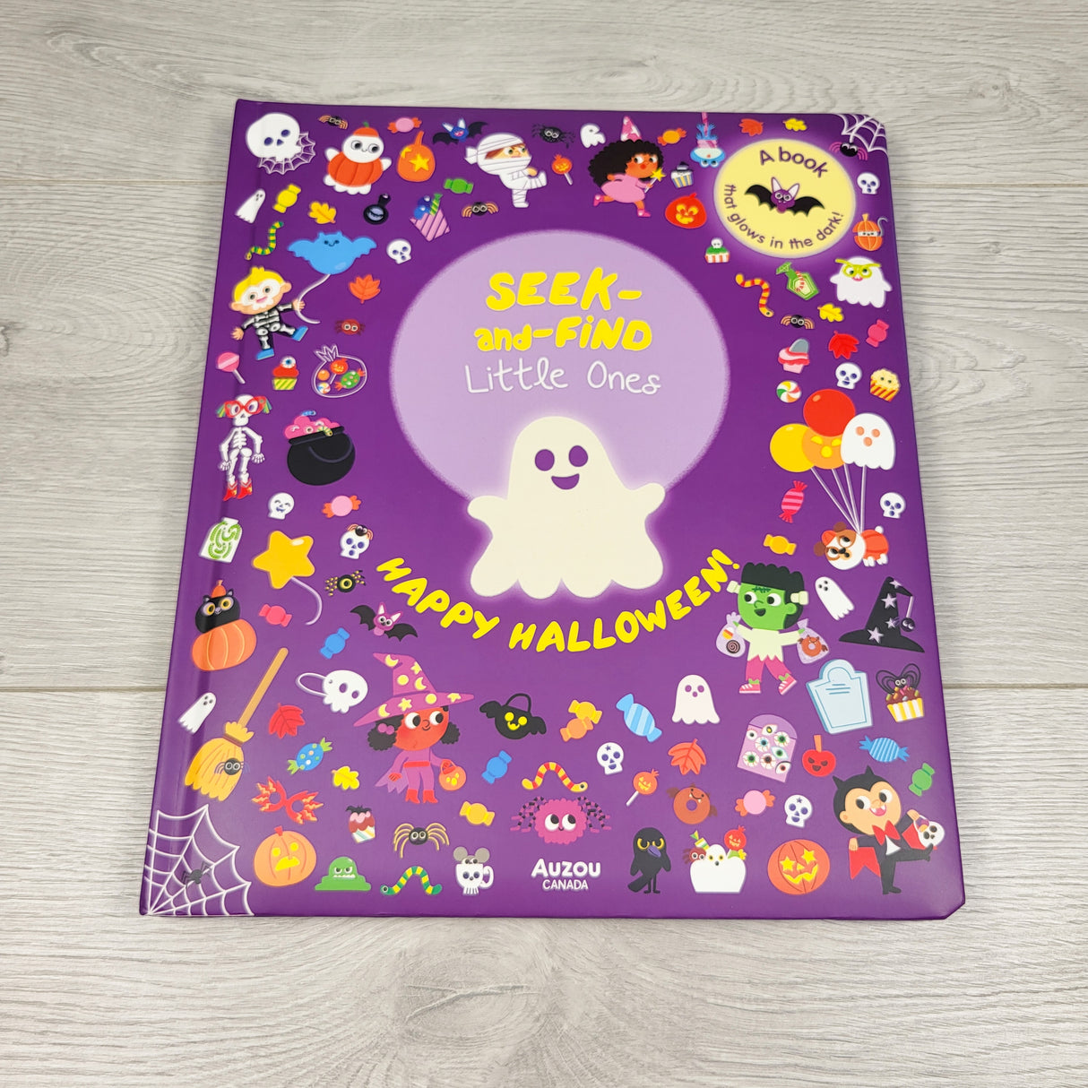 Happy Halloween. Large glow in the dark seek and find book