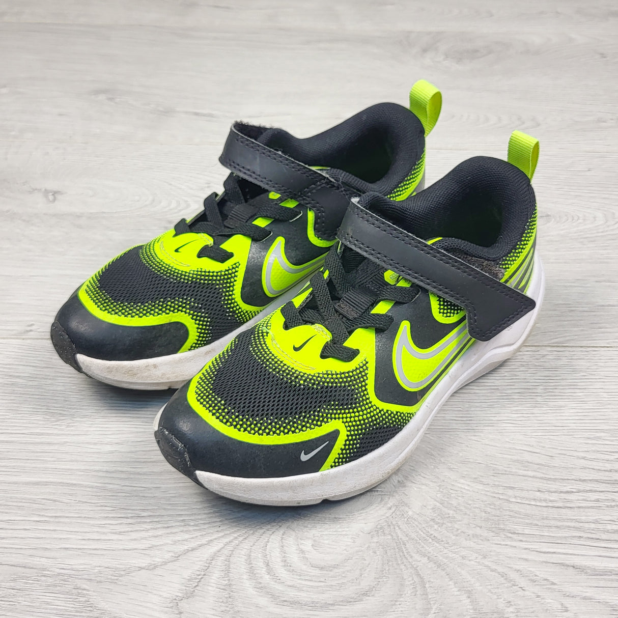 Nike black and neon yellow running shoes. Size 12