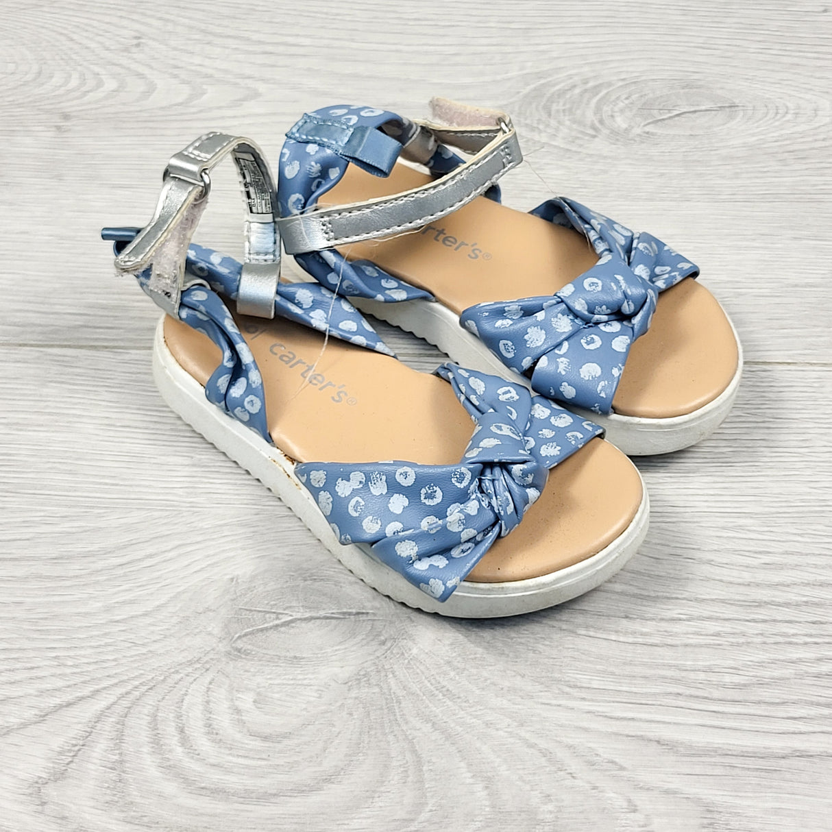 Carters blue polka dot bow sandals. Size 6