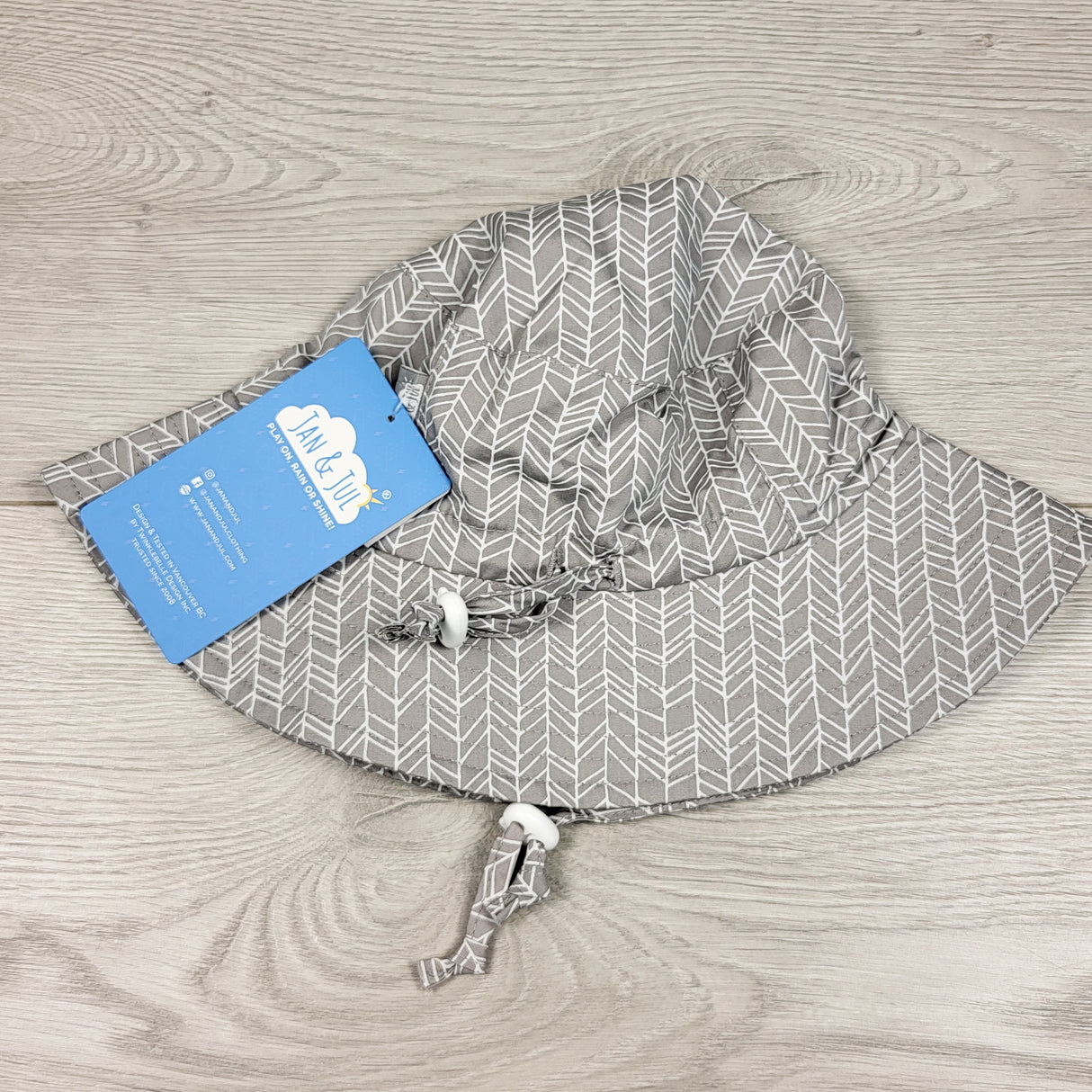 NEW - Jan and Jul grey patterned sun hat. Size medium (6-24 months)
