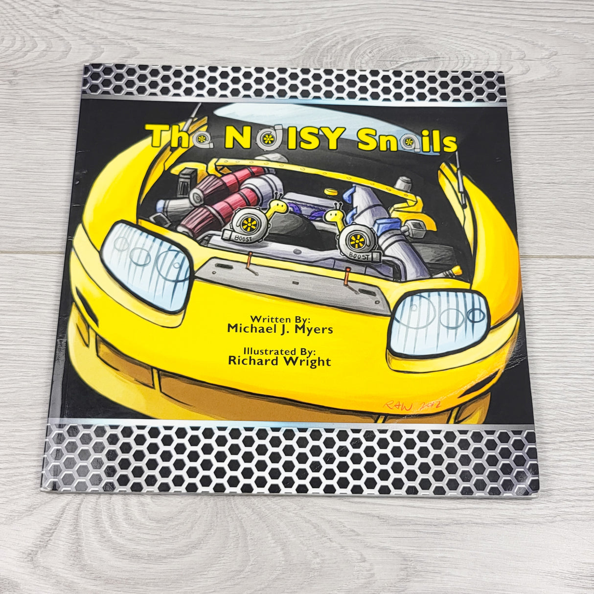 The Noisy Snails. Soft cover book