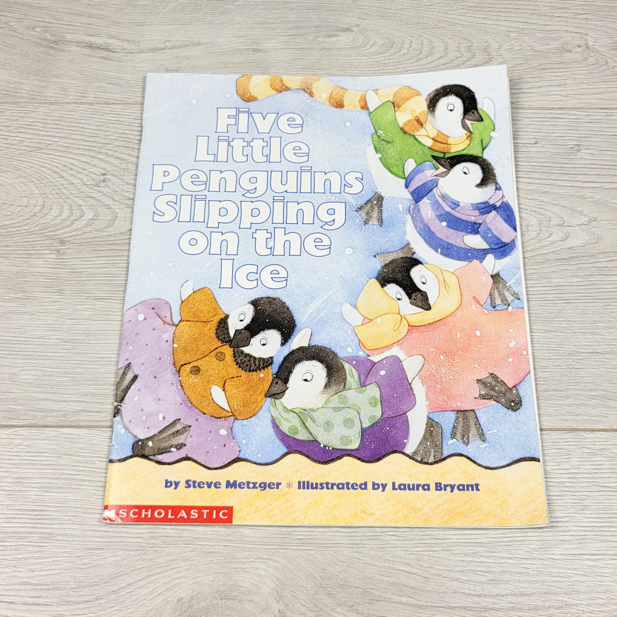 Five Little Penguins Slipping on Ice. Soft cover book