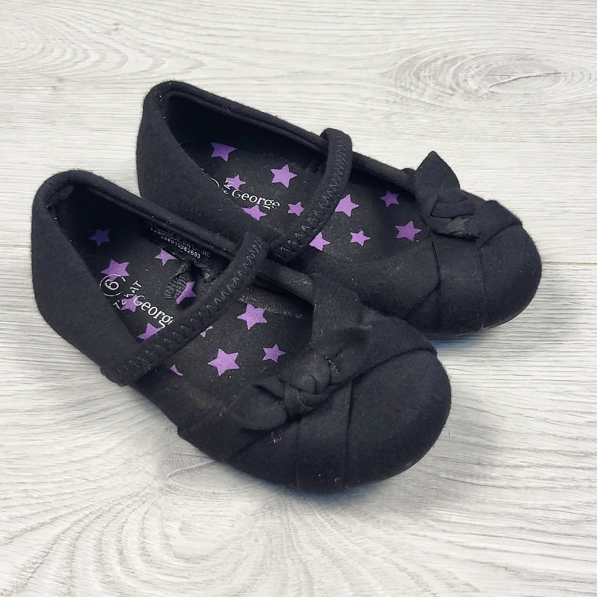 George black bow flats. Size 6