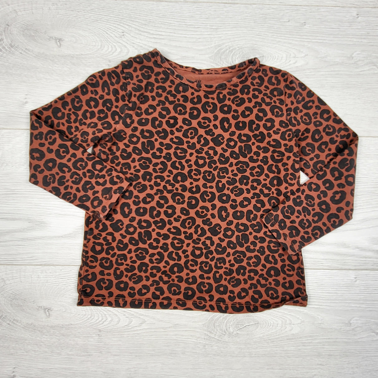 H and M tan leopard print top. Size 2-4T