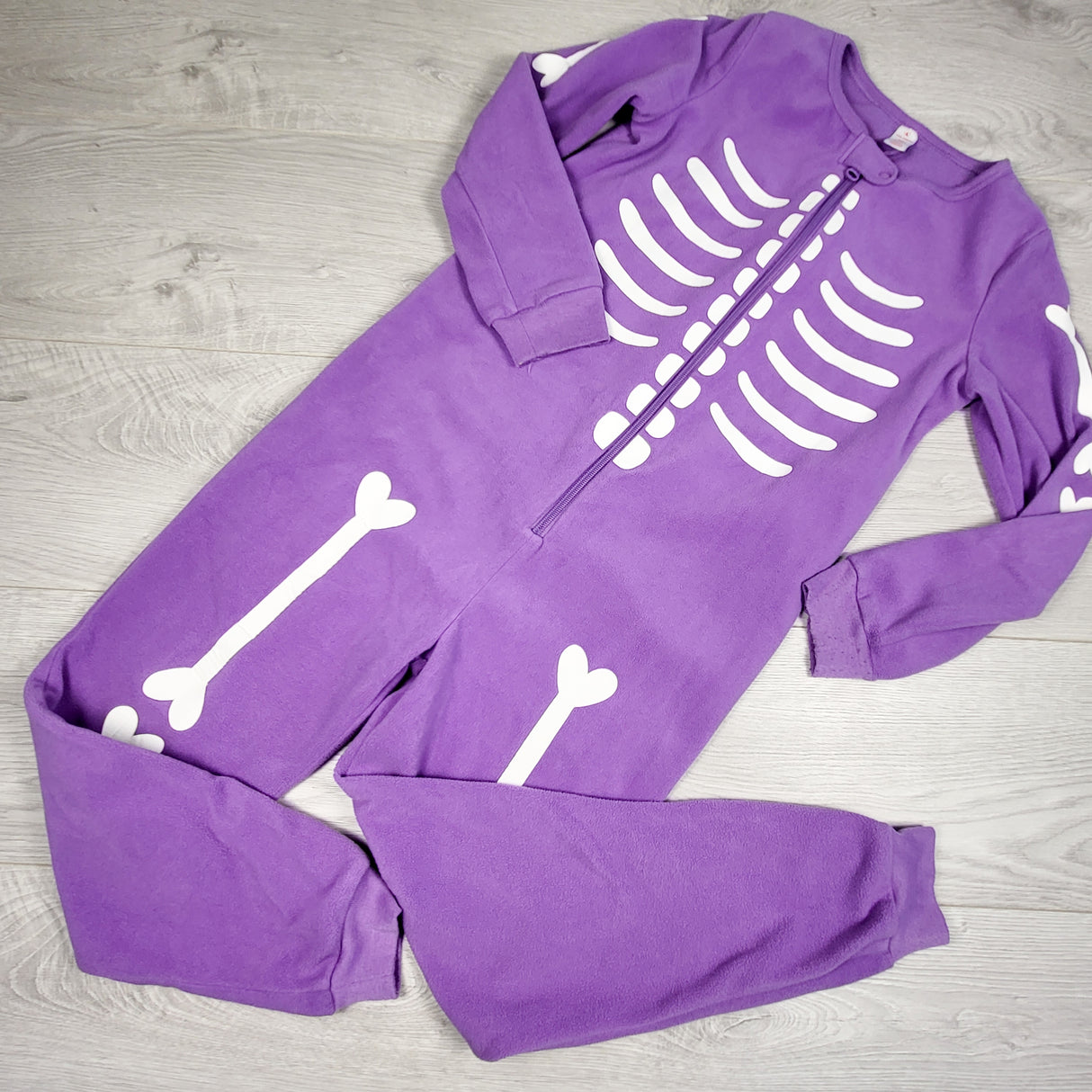 Joe purple zippered fleece skeleton sleeper. Size 7/8