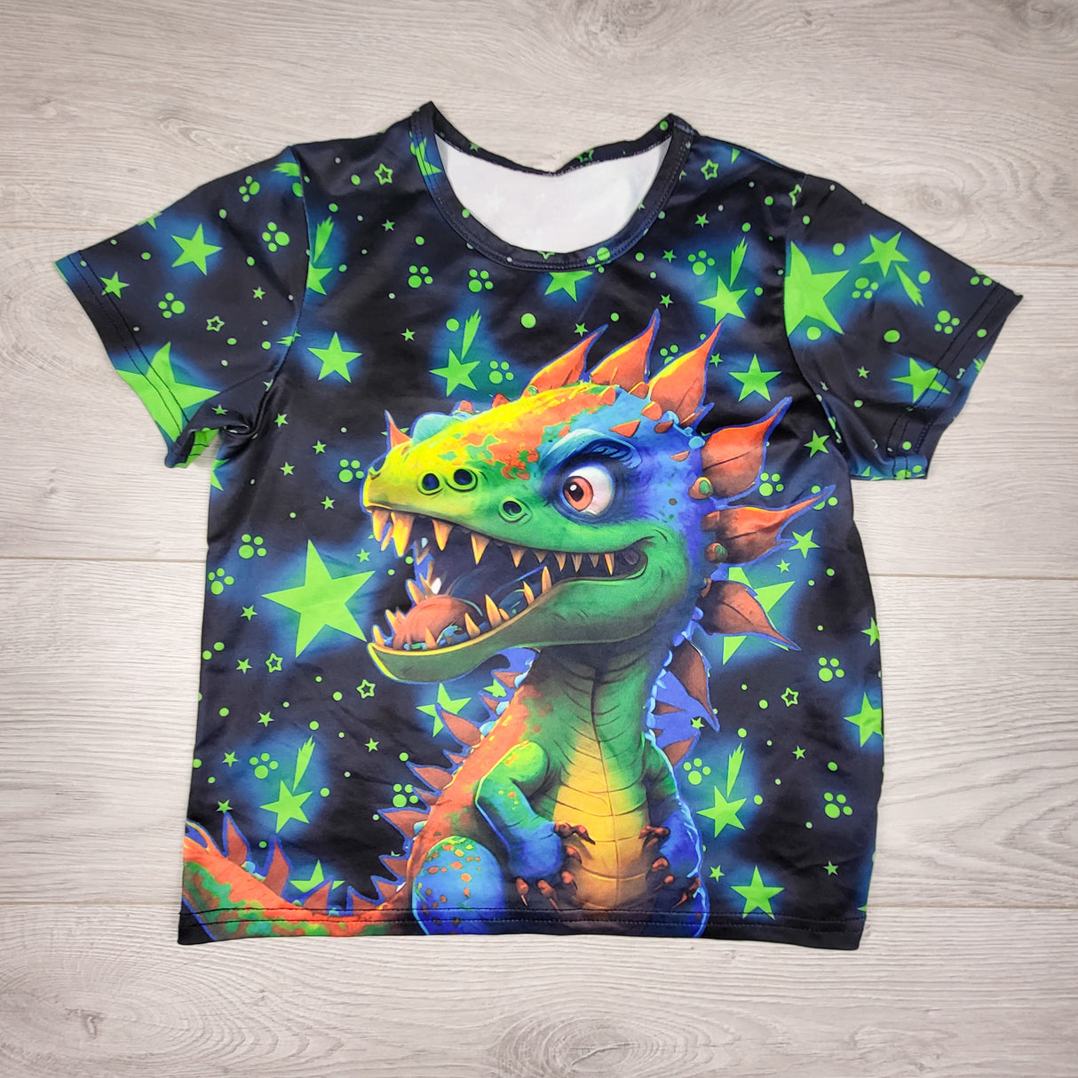 Dinosaur print t-shirt. Size 6