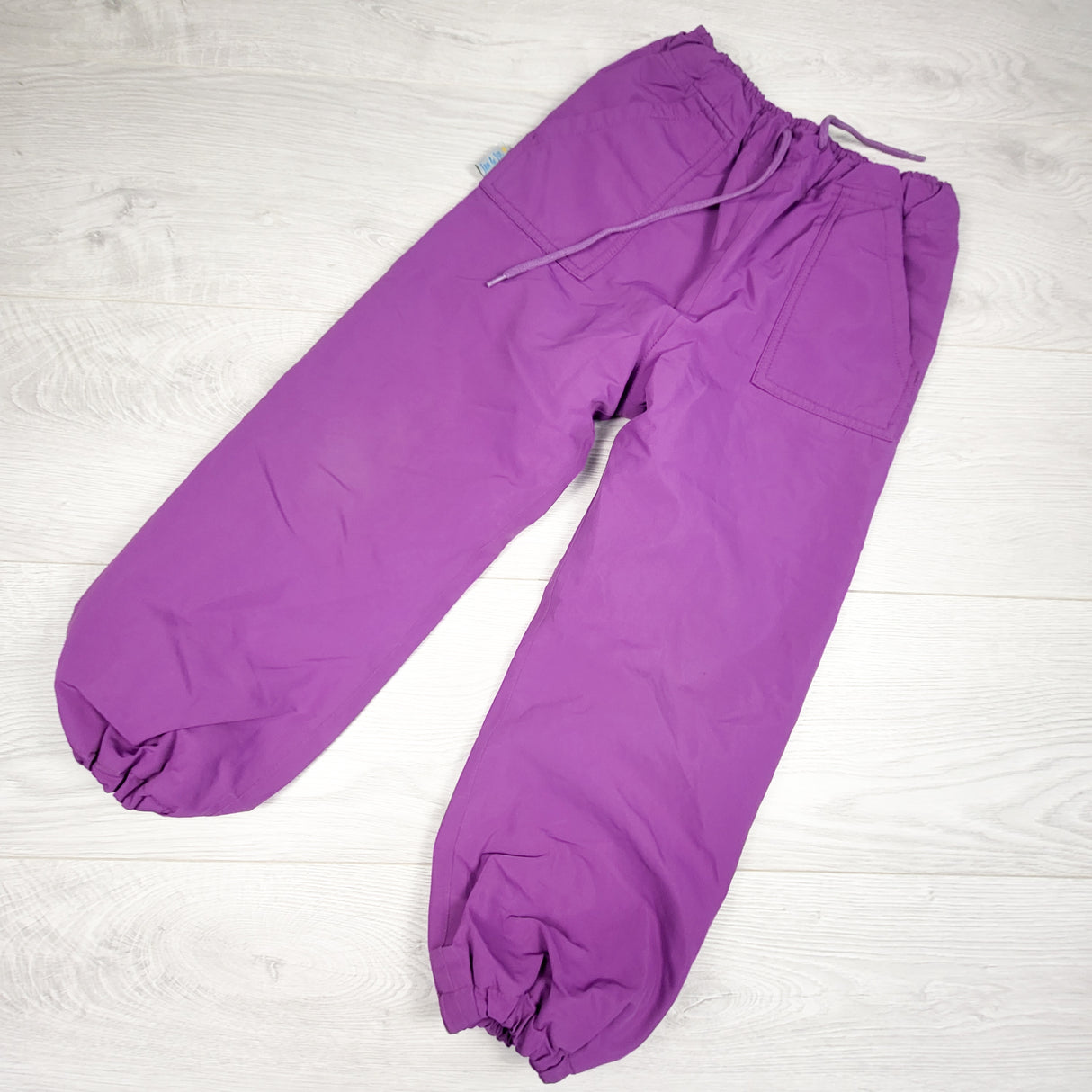 Jan and Jul purple fleece lined rain pants. Size 5T