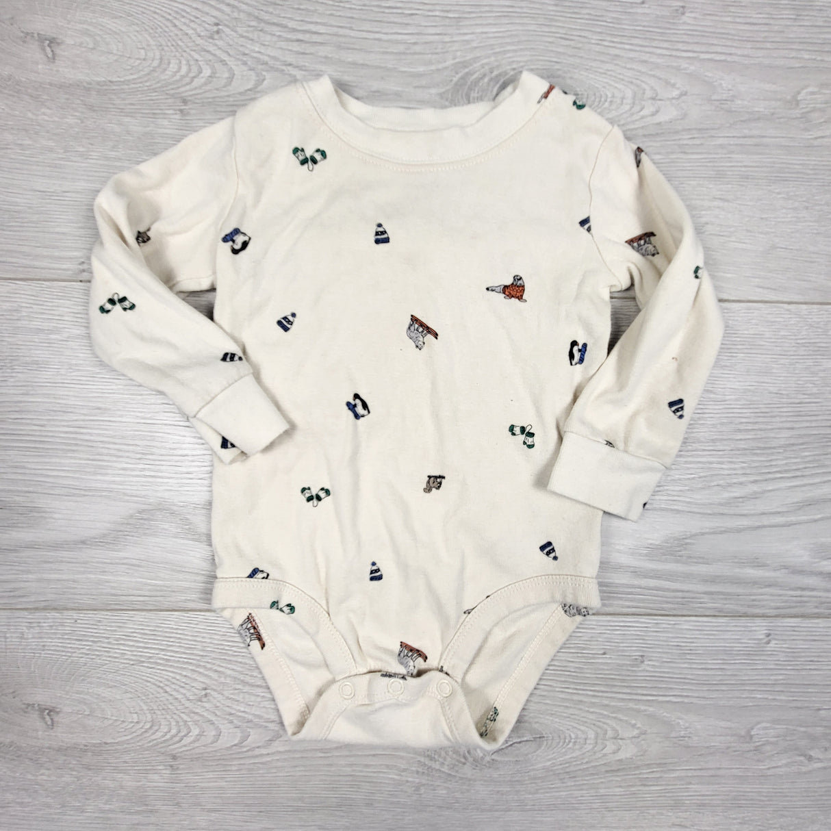Carters cream coloured bodysuit with winter animals. Size 12 months