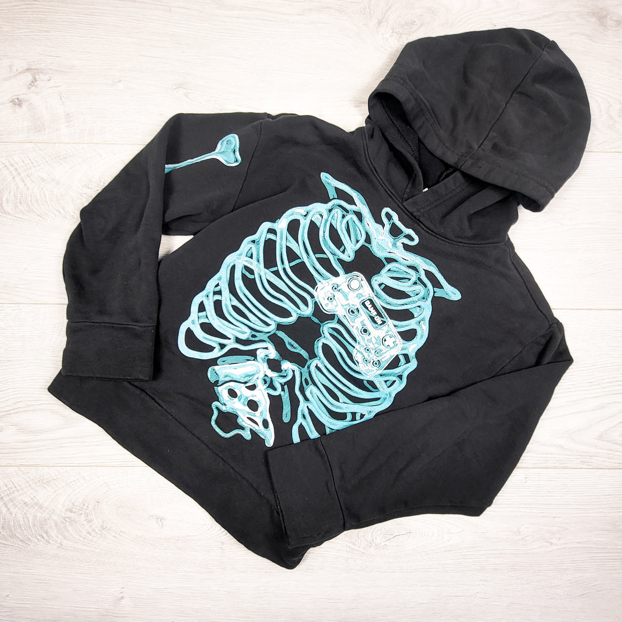 Old Navy black pullover skeleton hoodie. Size 8