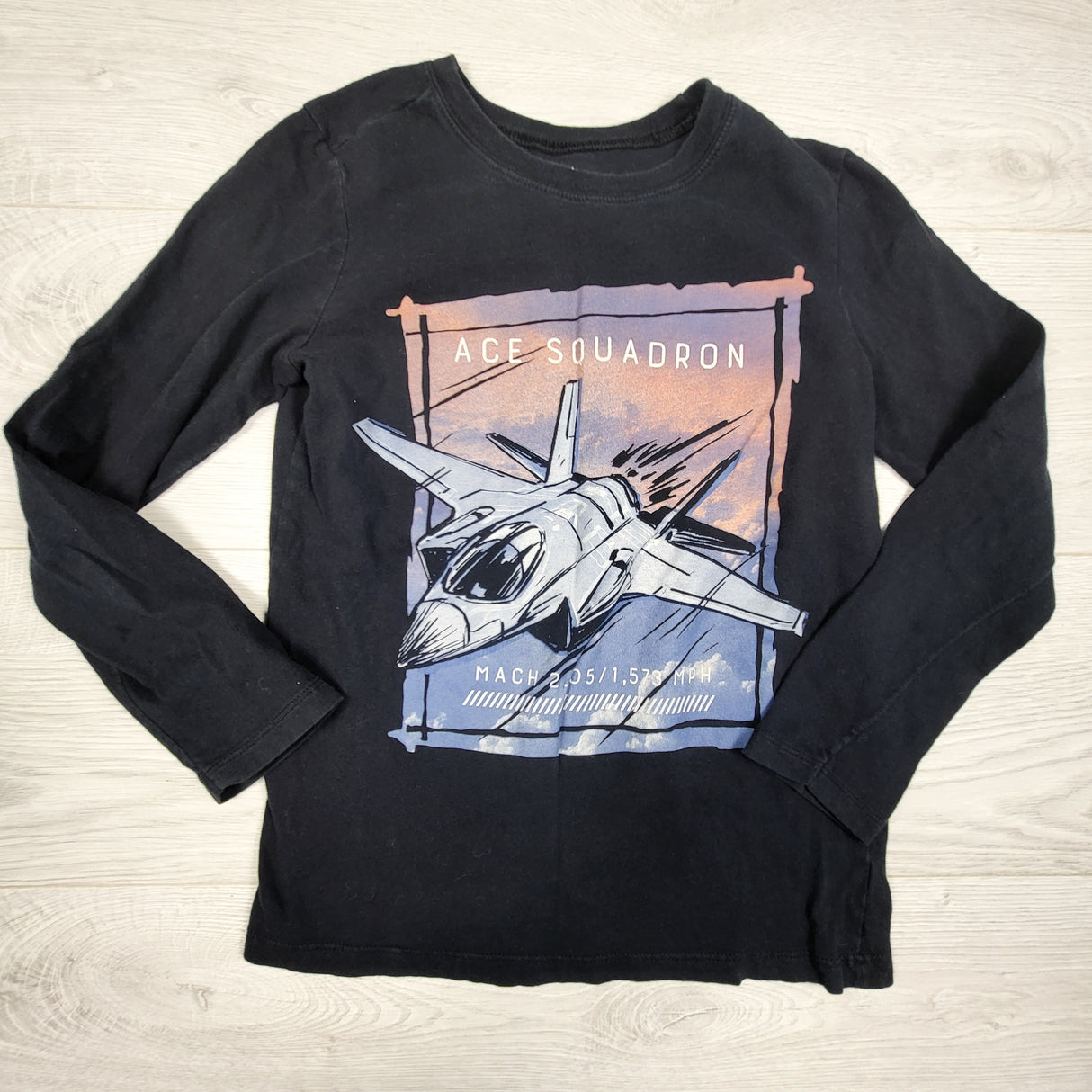 Carters black long sleeve top with jet. Size 8