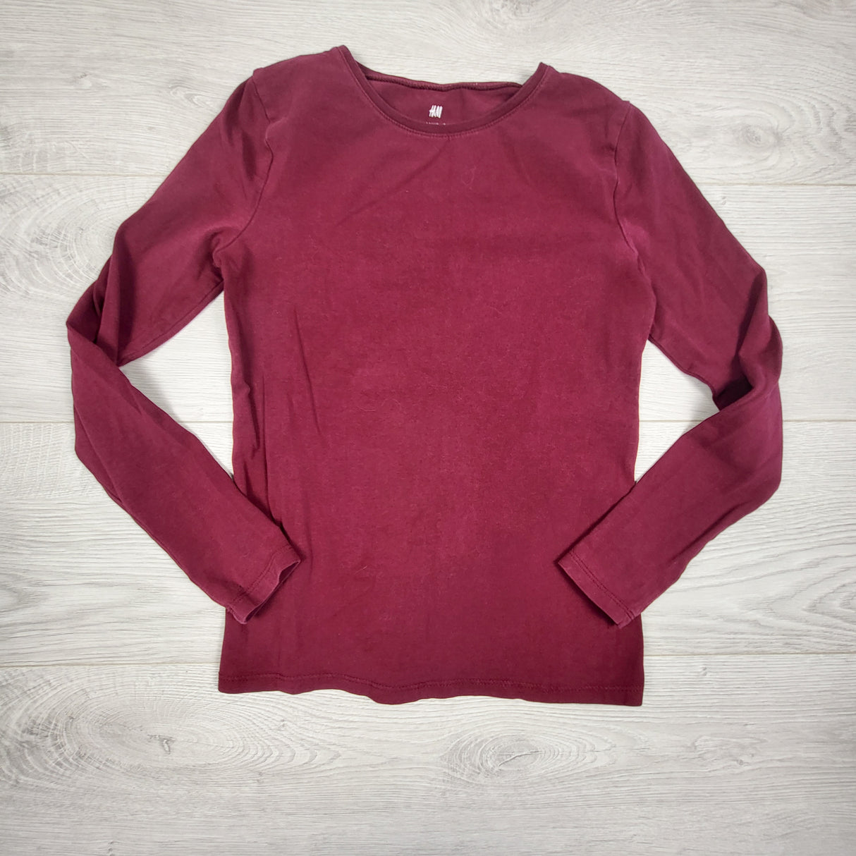H and M burgundy long sleeve top. Size 8-10 Years