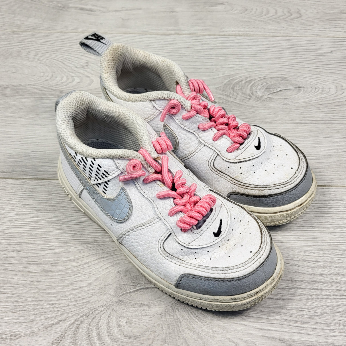 Nike Air Force One sneakers with elastic, no-tie laces. Size 10