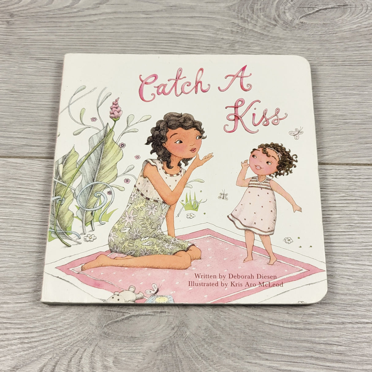 Catch a Kiss. Board book