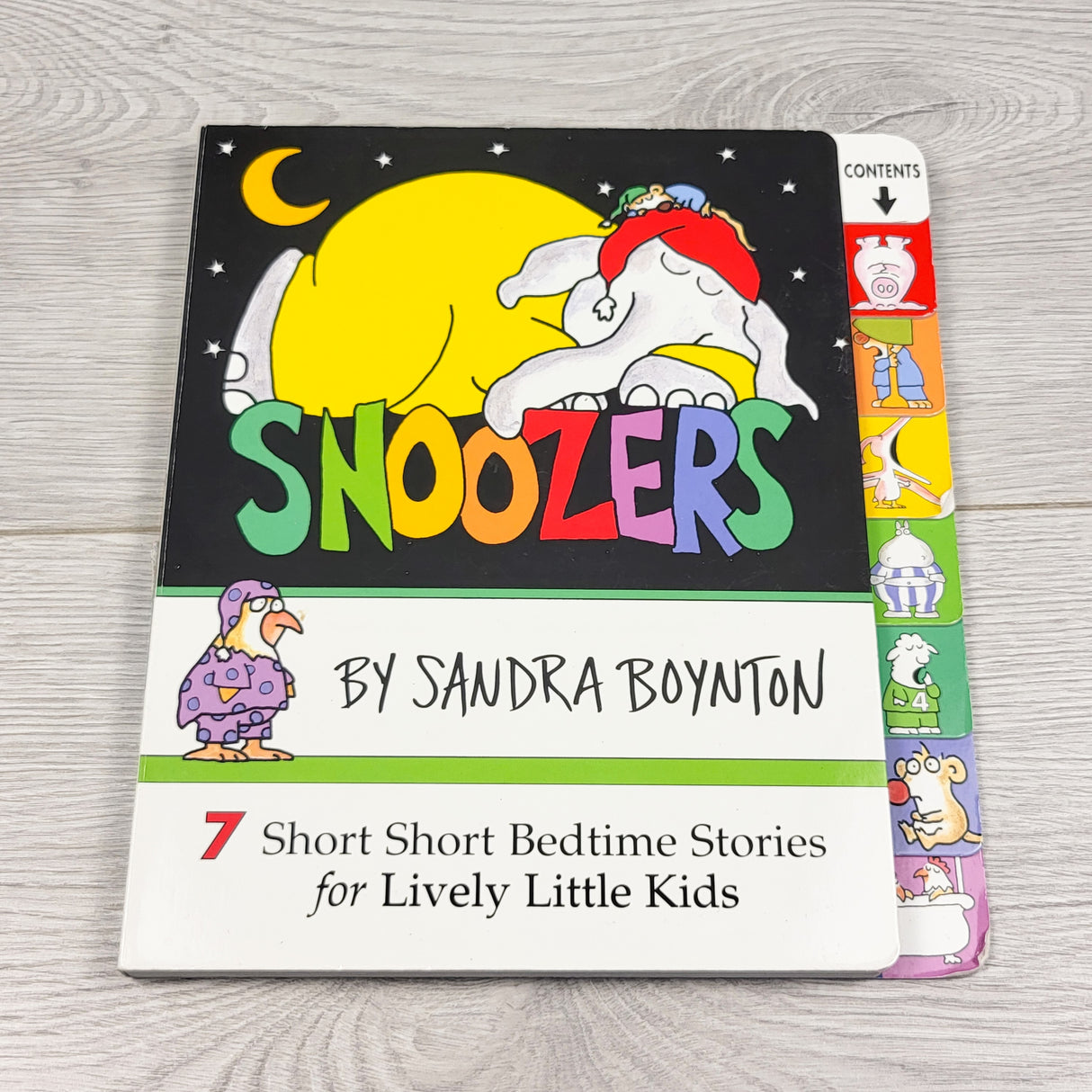 Snoozers. Board book with 7 short stories inside