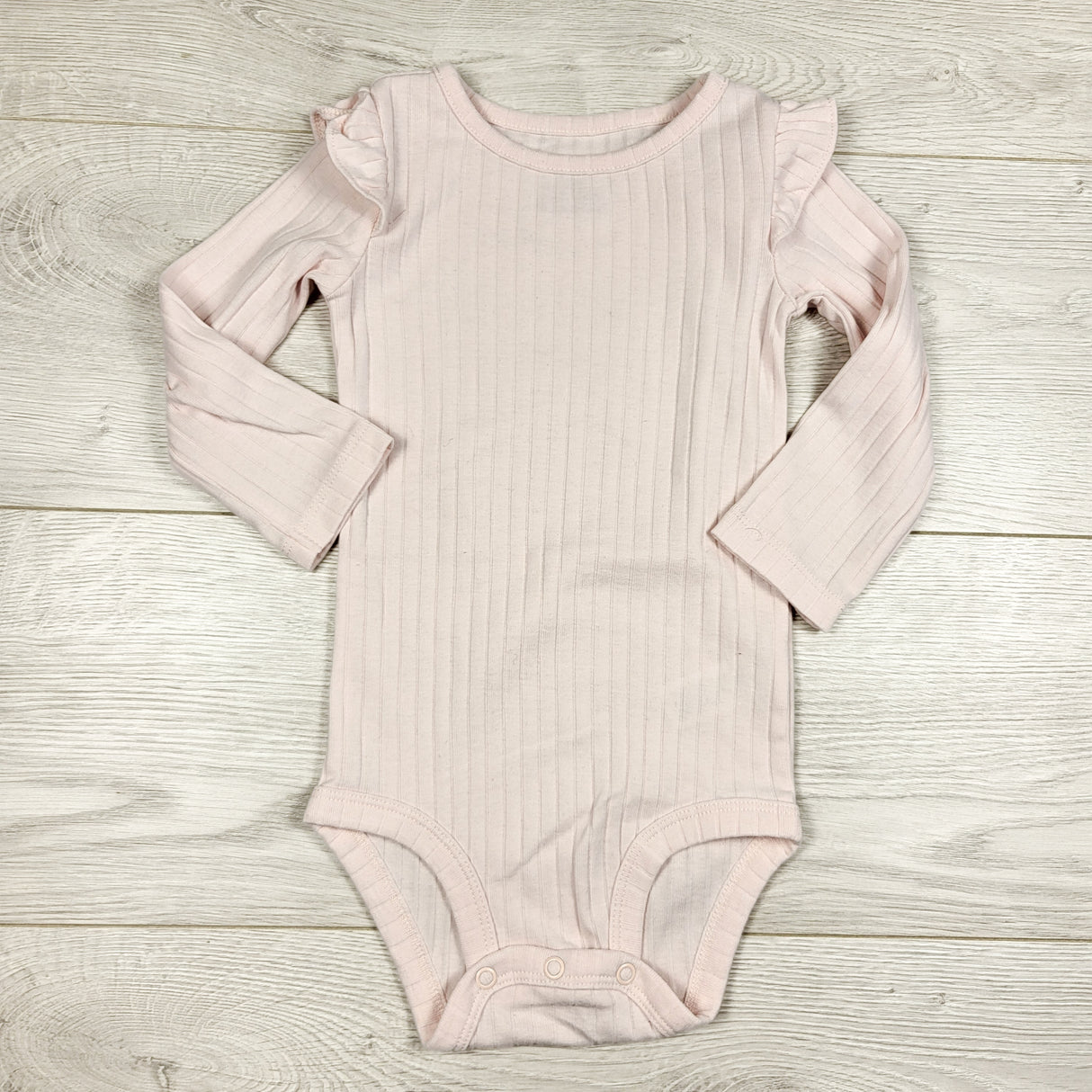 Carters pink ribbed bodysuit with ruffles. Size 18 months
