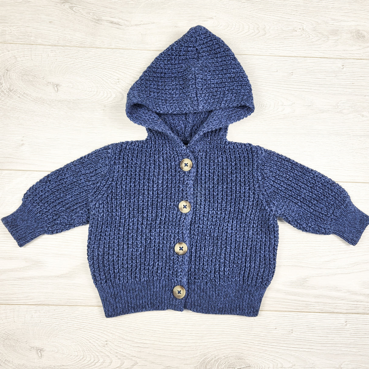 Old Navy blue hooded sweater. Size 3-6 months
