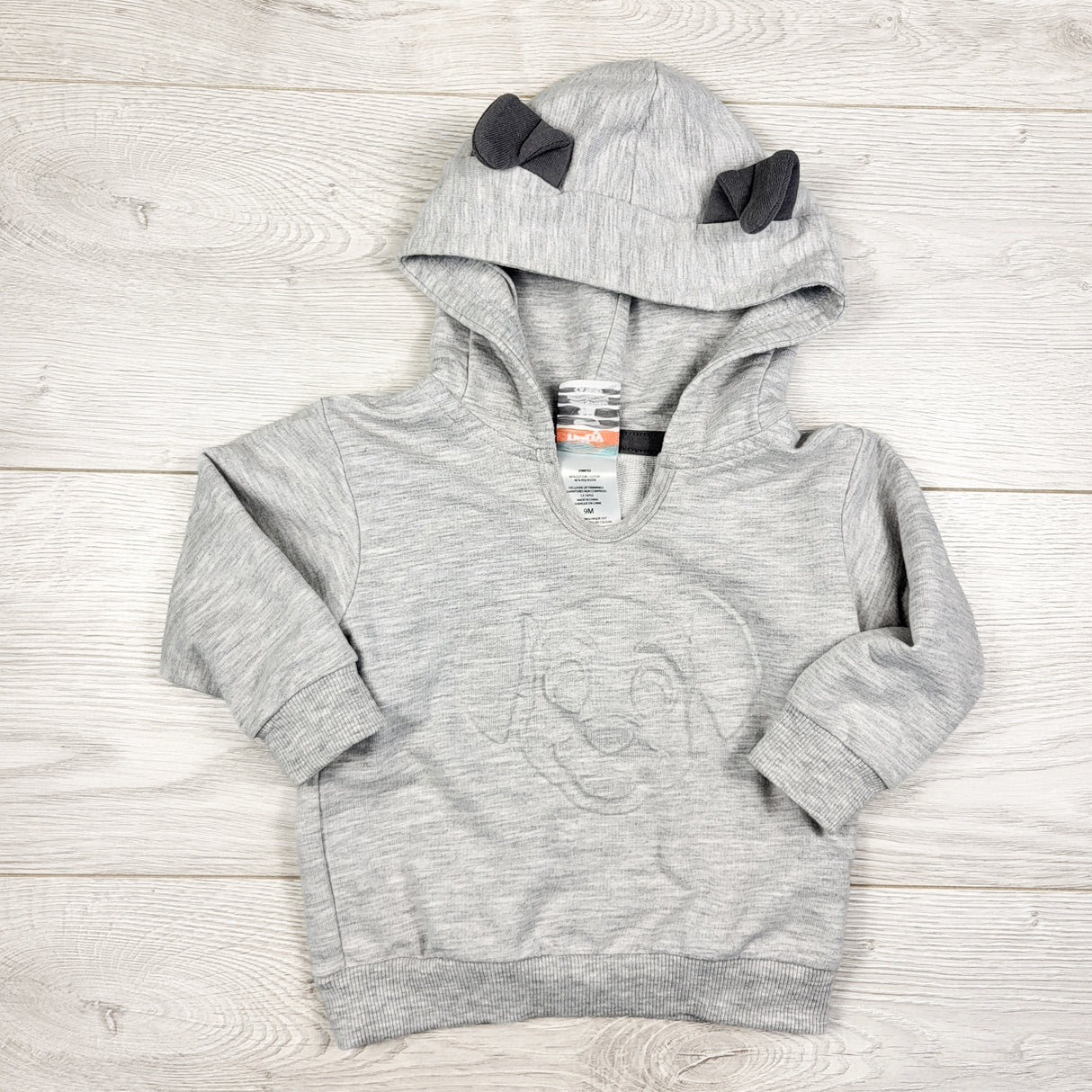 Disney grey 101 Dalmatians hoodie with embossed dog. Size 9 months