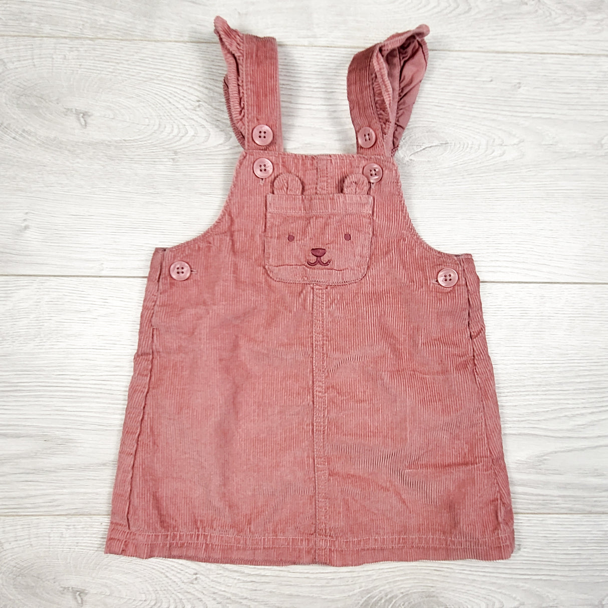 Carters pink corduroy dress with bear. Size 9 months