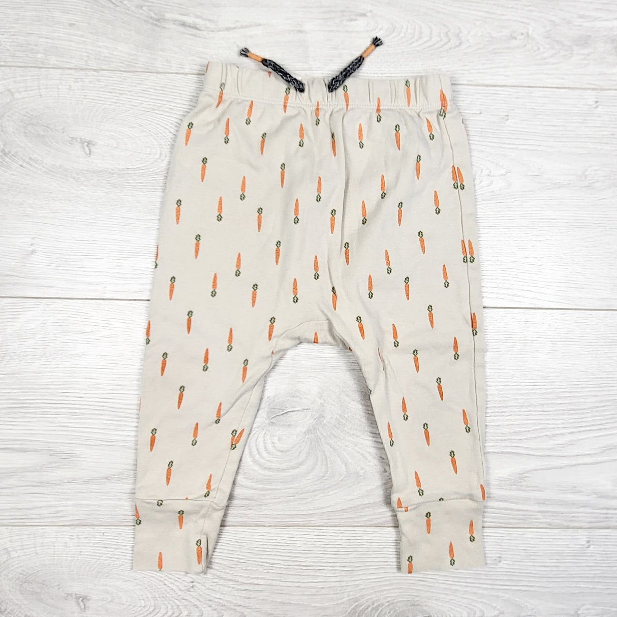 Joe beige carrot print pants. Size 6-12 months