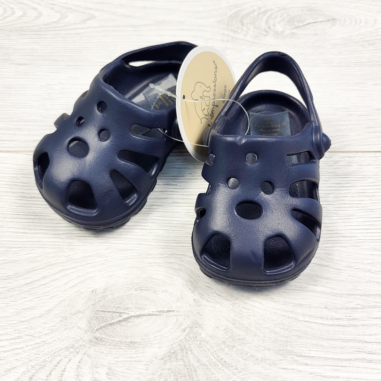 NEW - First Impression navy rubber sandals. Size 2