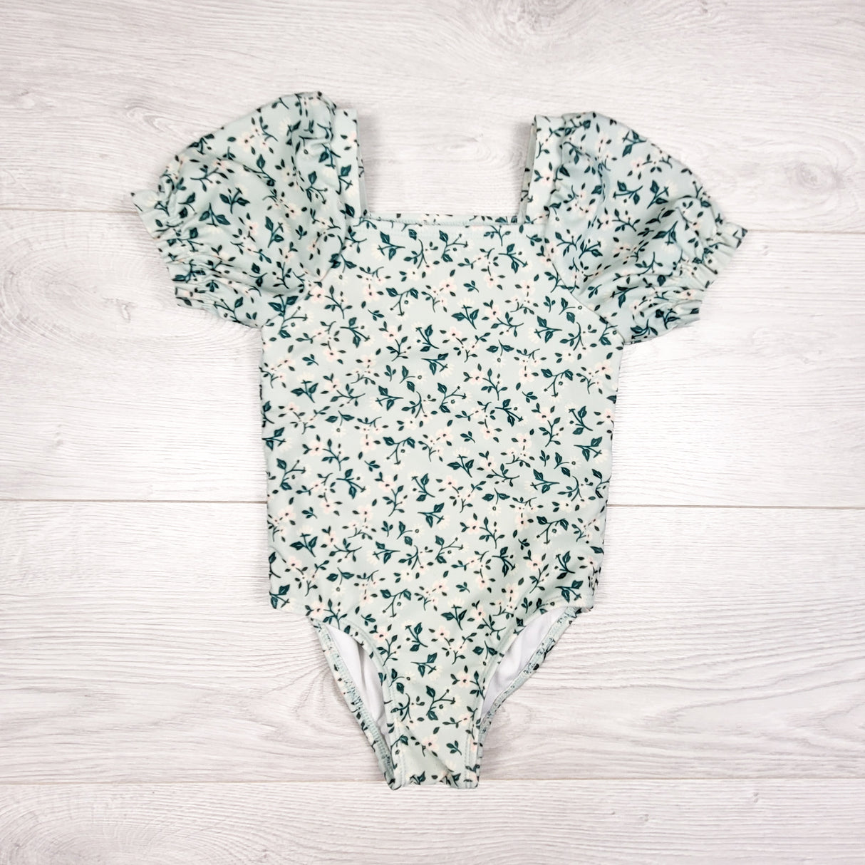 Cat and Jack green floral print puff sleeve one piece swimsuit. Size 2T
