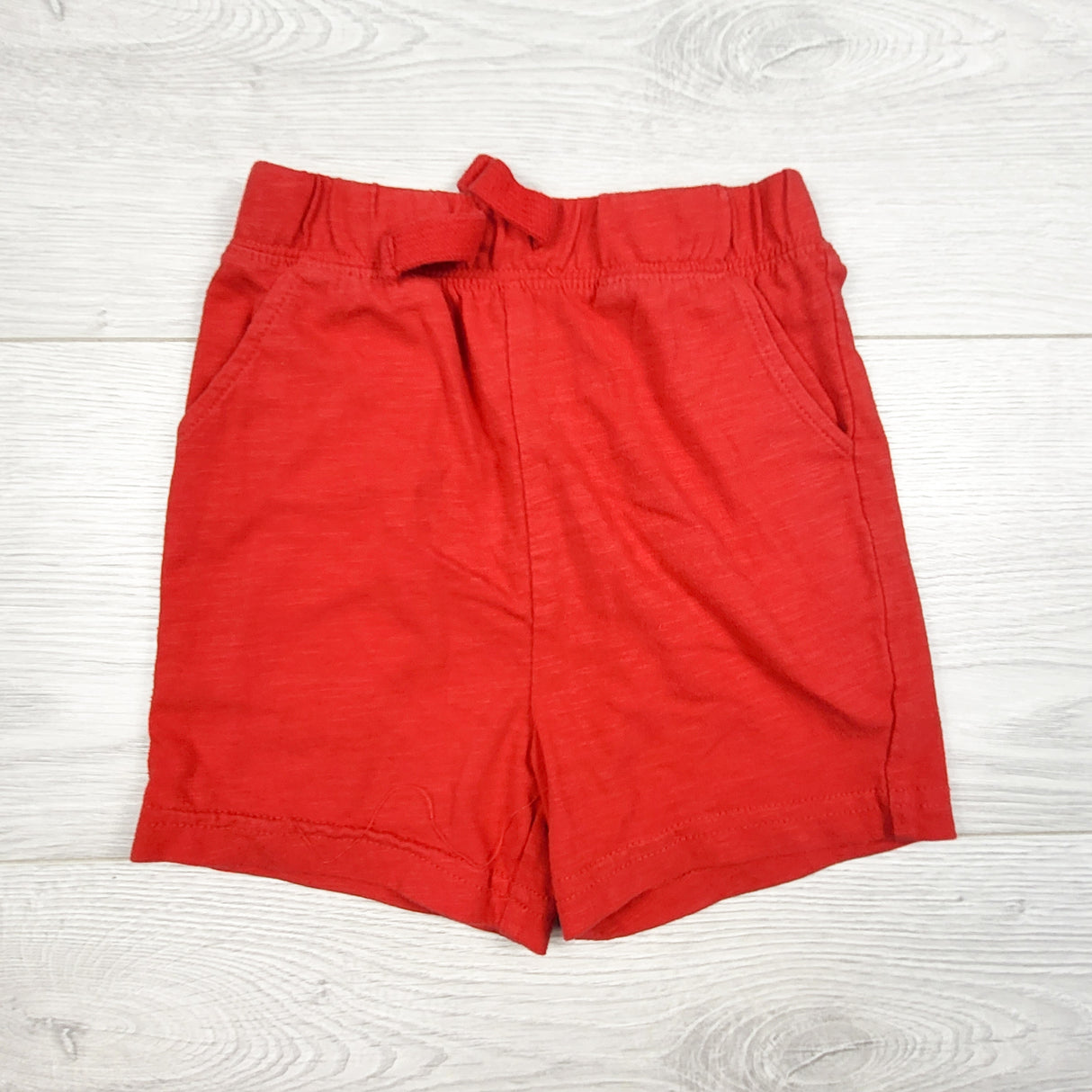 George red cotton shorts. Size 18-24 months