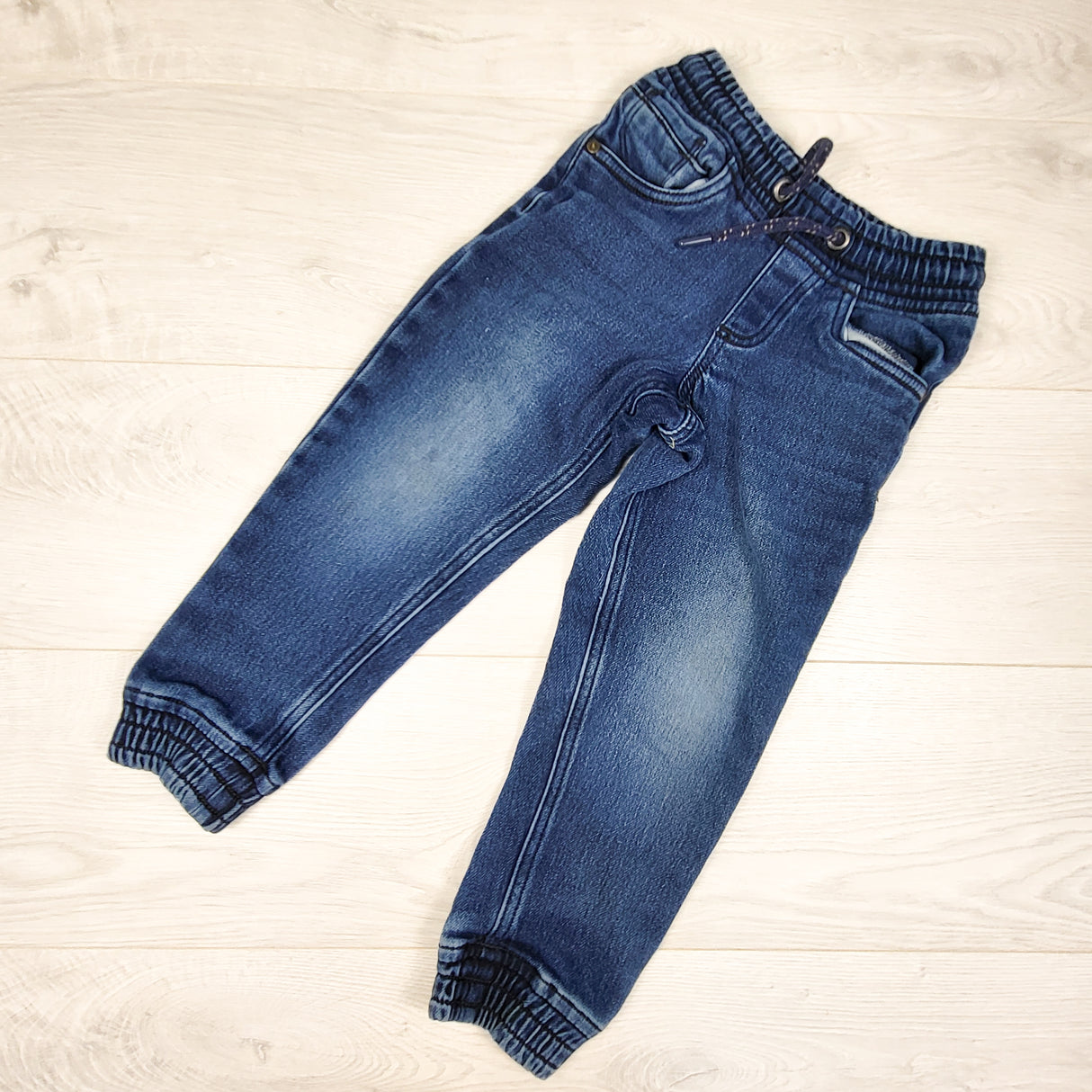 Distressed denim drawstring joggers. Size 4T