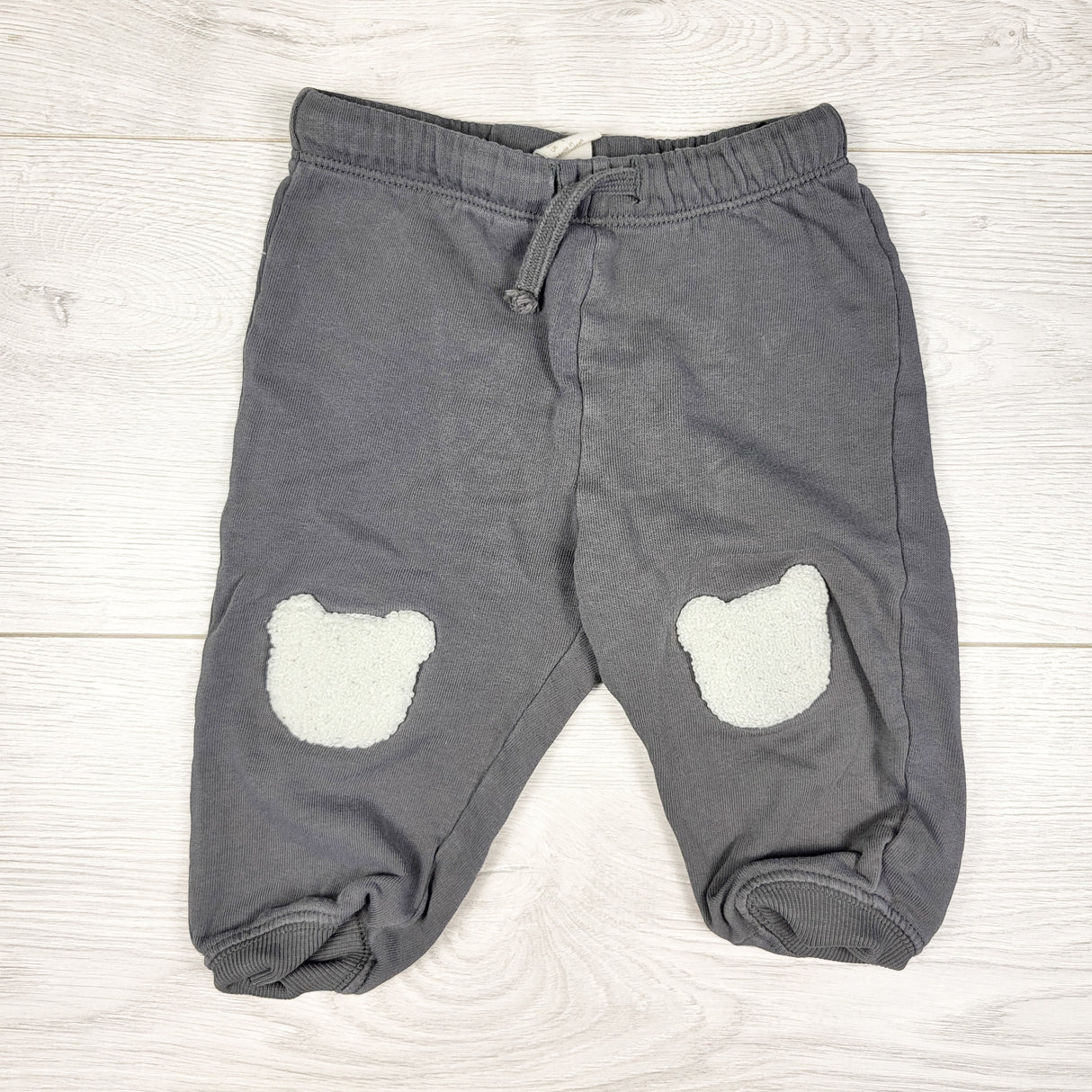 H and M grey joggers with chenille bear knee patches. Size 6-9 months