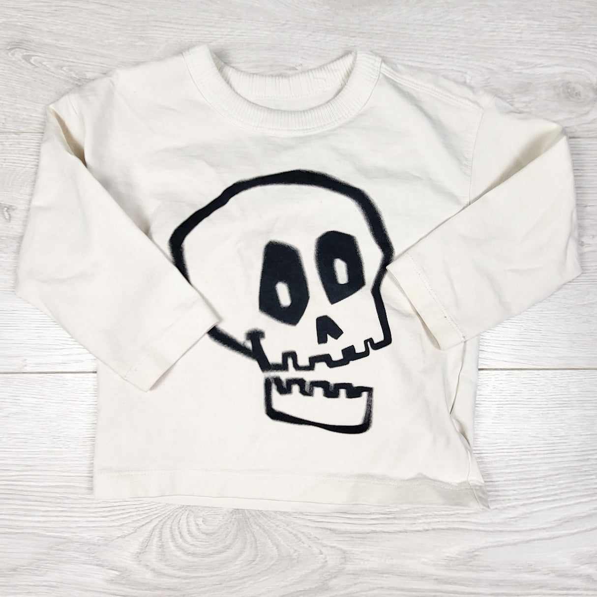 H and M white long sleeve top with skull. Size 18-24 months - AS IS