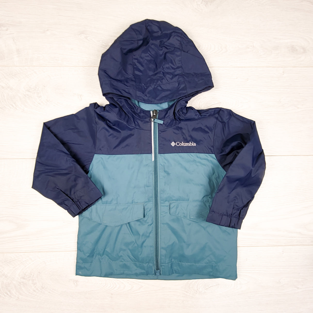 Columbia teal and navy fleece lined hooded "Zilla" rain jacket. Size 2T