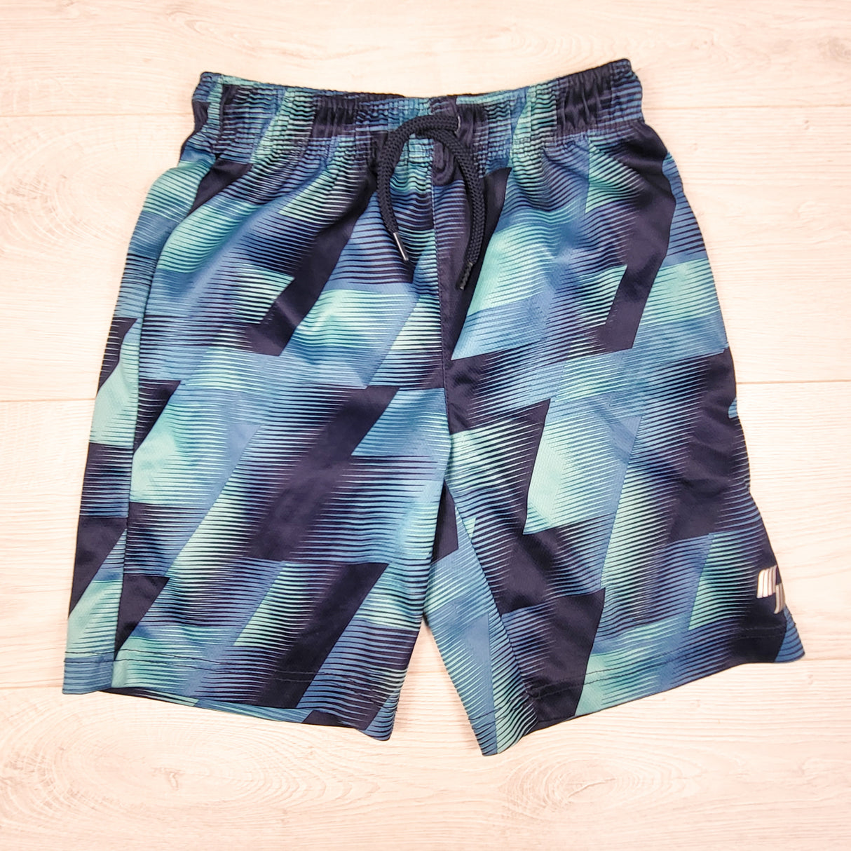 Children's Place blue patterned drawstring active shorts. Size 7/8
